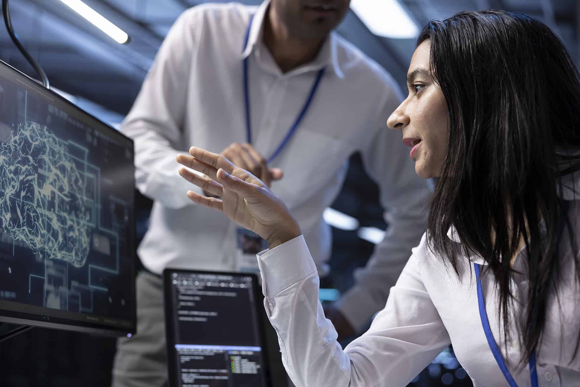 Coworkers using AI tech to fix errors in server farm providing storage